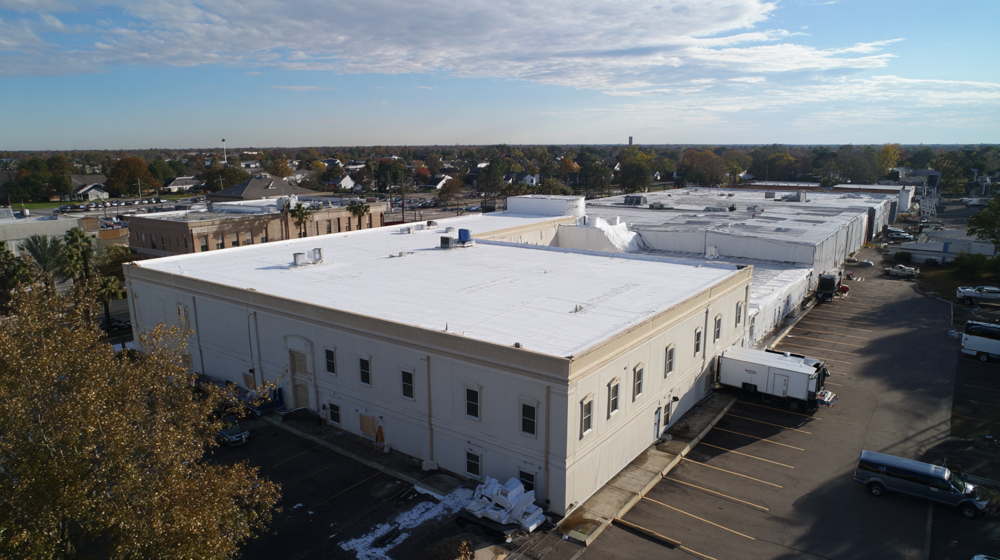 Spray polyurethane foam (SPF) roofing on large commercial building aerial view